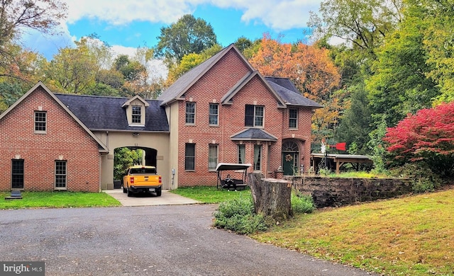 view of front property with a front lawn