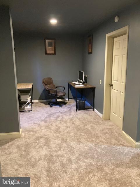 view of carpeted office space