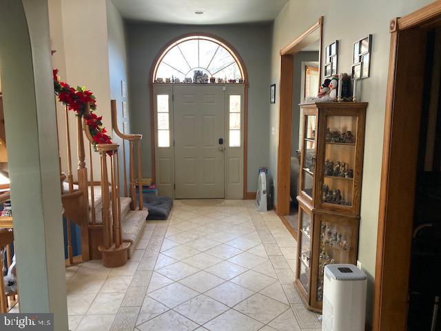 view of tiled entrance foyer