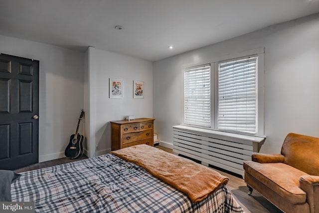 bedroom featuring hardwood / wood-style floors