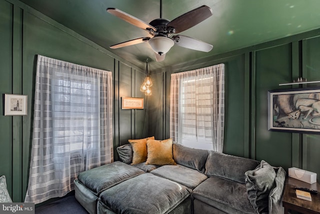 living room featuring ceiling fan