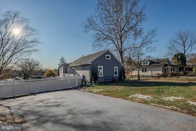 view of home's exterior featuring a yard