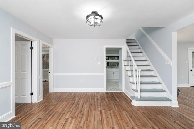 interior space with hardwood / wood-style flooring and sink