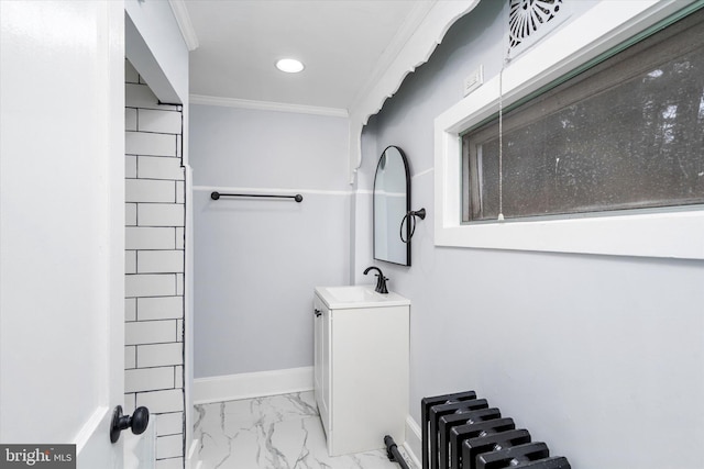 bathroom with vanity and ornamental molding