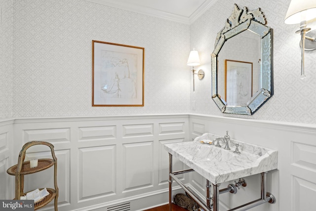 bathroom with ornamental molding