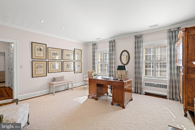 office area featuring a healthy amount of sunlight, light colored carpet, and ornamental molding