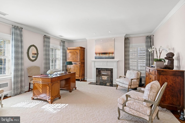 office space featuring a premium fireplace and crown molding