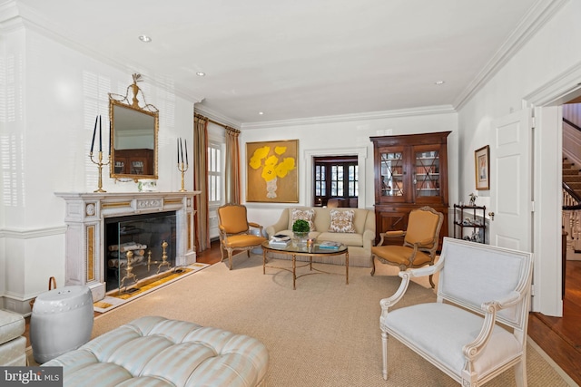 living room featuring crown molding