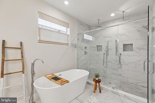 full bathroom with a freestanding bath, marble finish floor, a shower stall, and recessed lighting