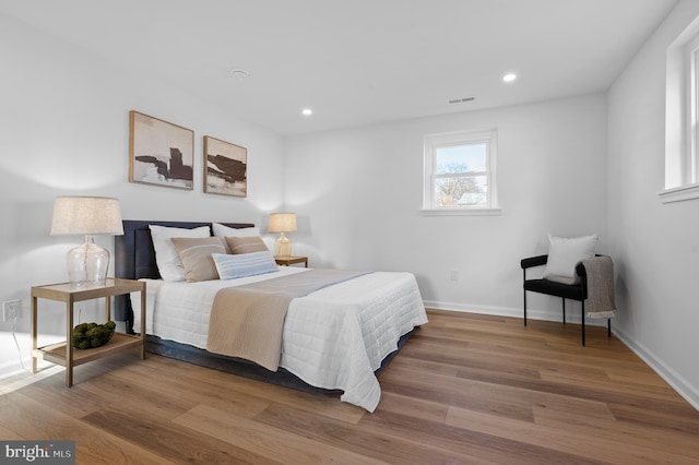 bedroom featuring hardwood / wood-style flooring