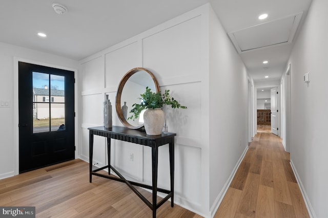 entrance foyer with light hardwood / wood-style flooring