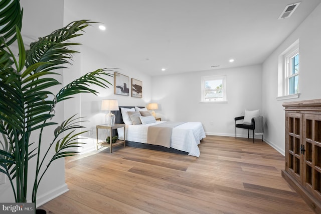 bedroom with light hardwood / wood-style flooring