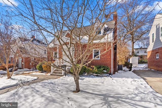 view of front of house featuring central AC