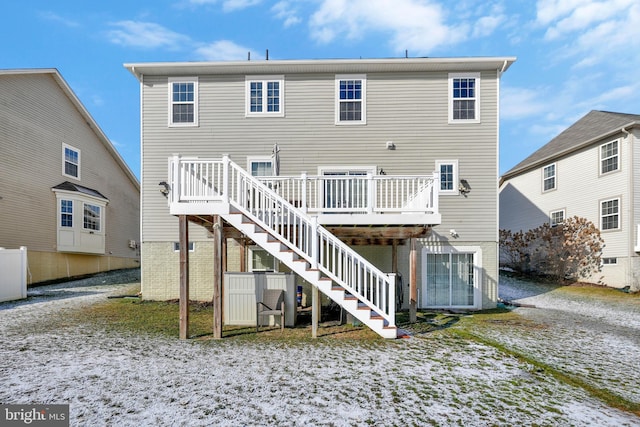 rear view of house with a deck