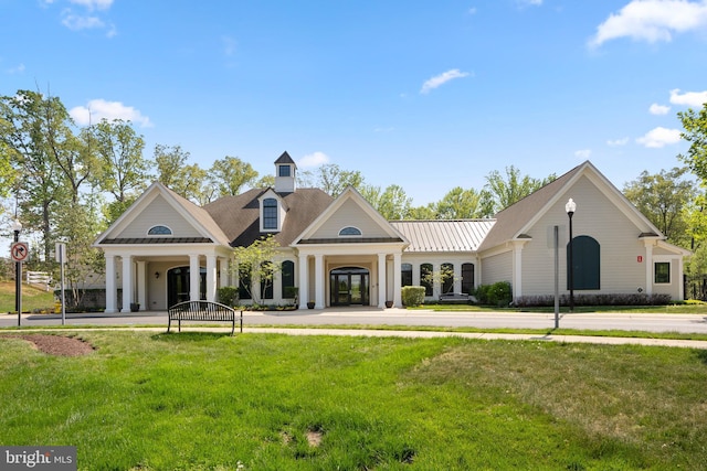 view of front of house with a front lawn