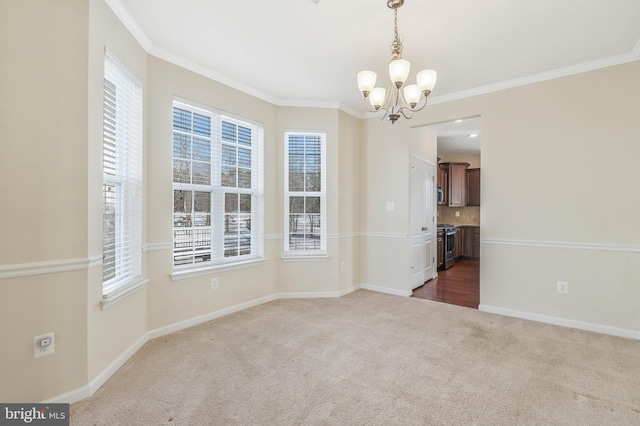 unfurnished dining area with crown molding, a chandelier, and dark carpet