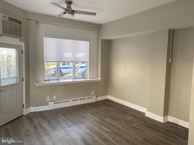 interior space with ceiling fan, a healthy amount of sunlight, a wall mounted AC, and a baseboard radiator