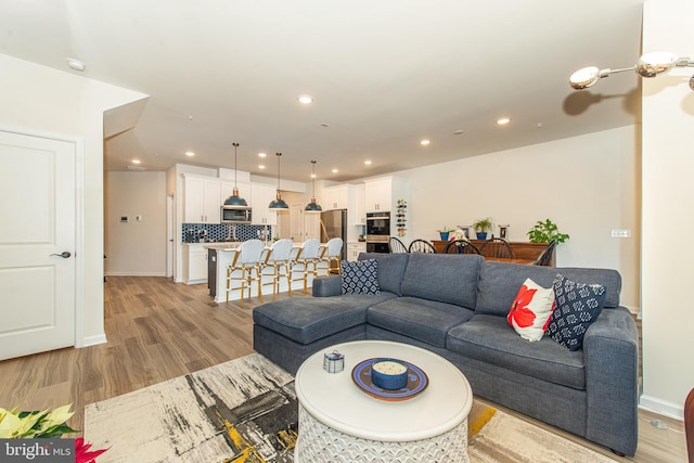 living room featuring light hardwood / wood-style floors