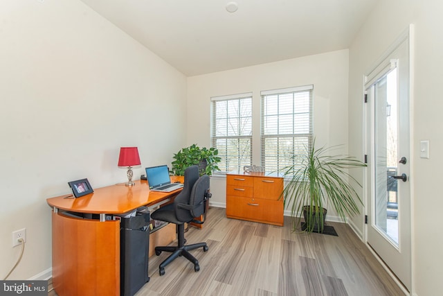 office area with light wood-type flooring