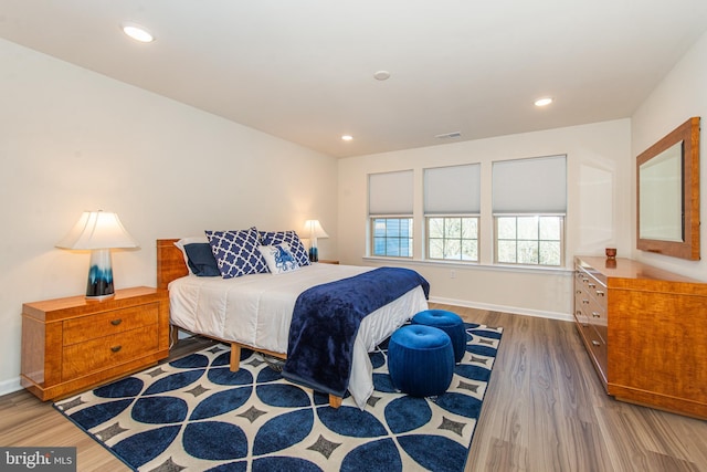 bedroom featuring light wood-type flooring