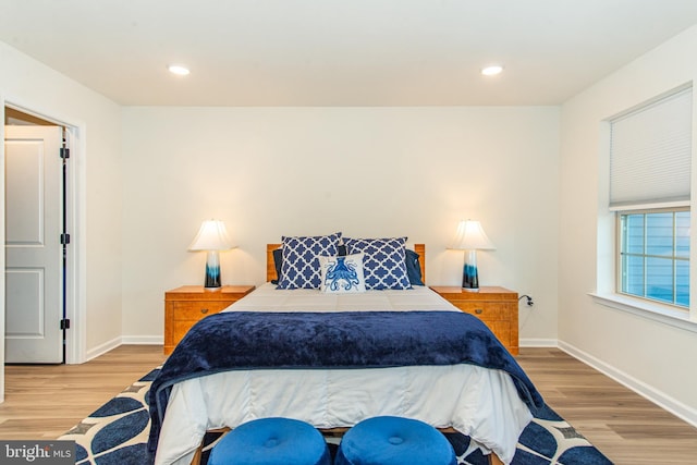 bedroom featuring light wood-type flooring