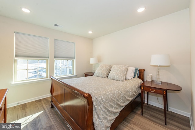 bedroom featuring dark wood-type flooring