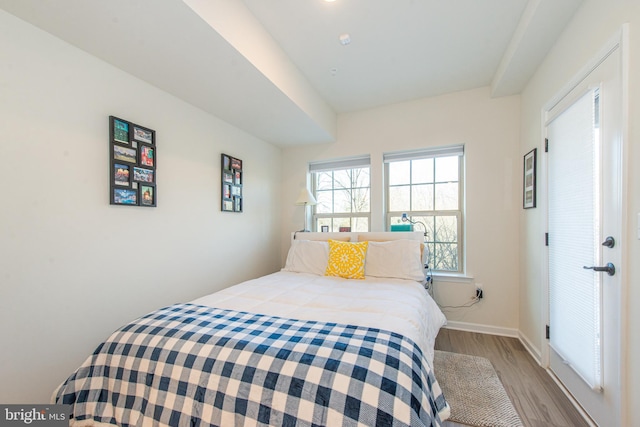 bedroom with light hardwood / wood-style flooring