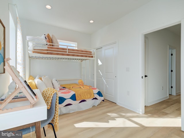 bedroom featuring light wood-type flooring