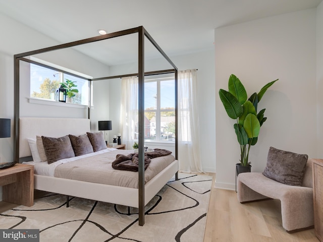 bedroom featuring light wood-type flooring