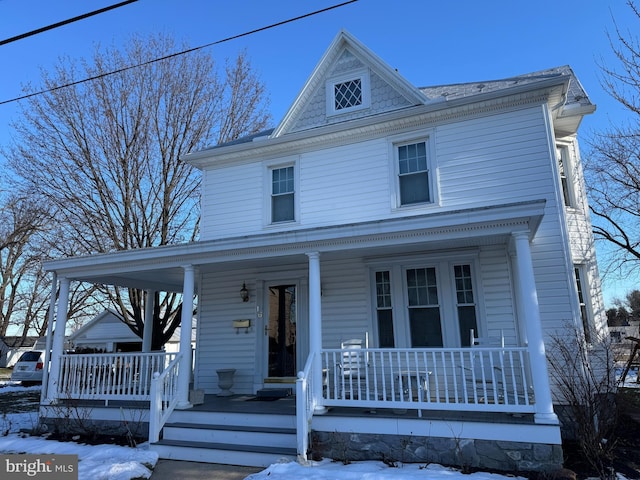 view of front of home featuring covered porch