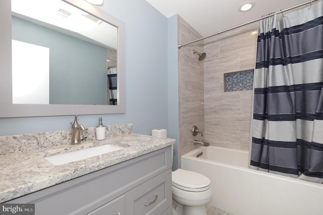 full bathroom with vanity, toilet, and shower / bathtub combination with curtain