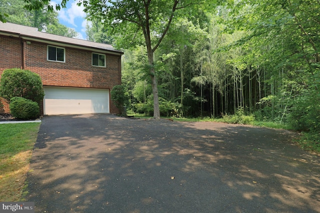 view of home's exterior featuring a garage