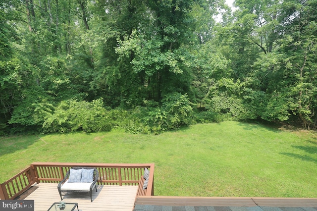 view of yard featuring a wooden deck