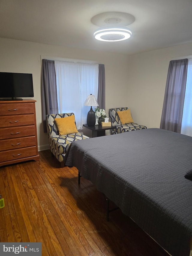 bedroom featuring wood-type flooring