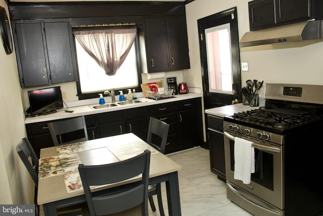 kitchen with sink and stainless steel gas range oven