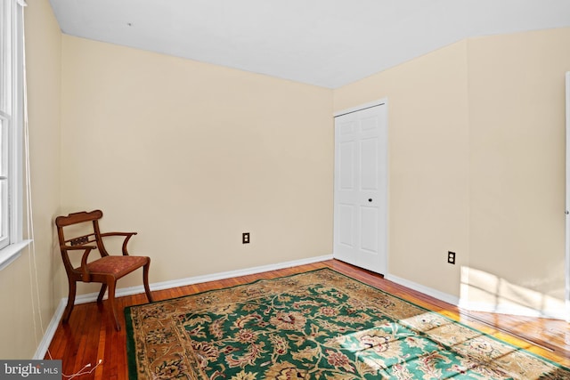 empty room featuring dark wood-type flooring