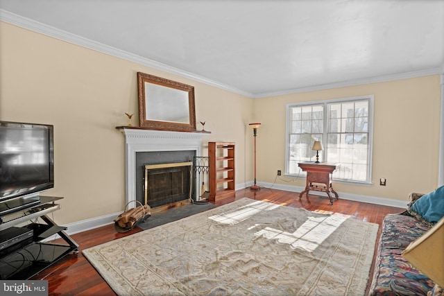 living room featuring ornamental molding and hardwood / wood-style floors