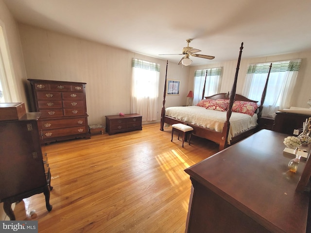 bedroom featuring ceiling fan and light hardwood / wood-style floors