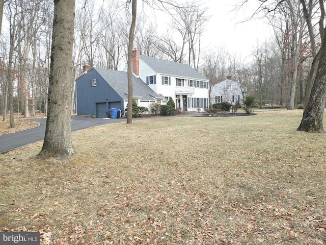 exterior space with a garage and a porch