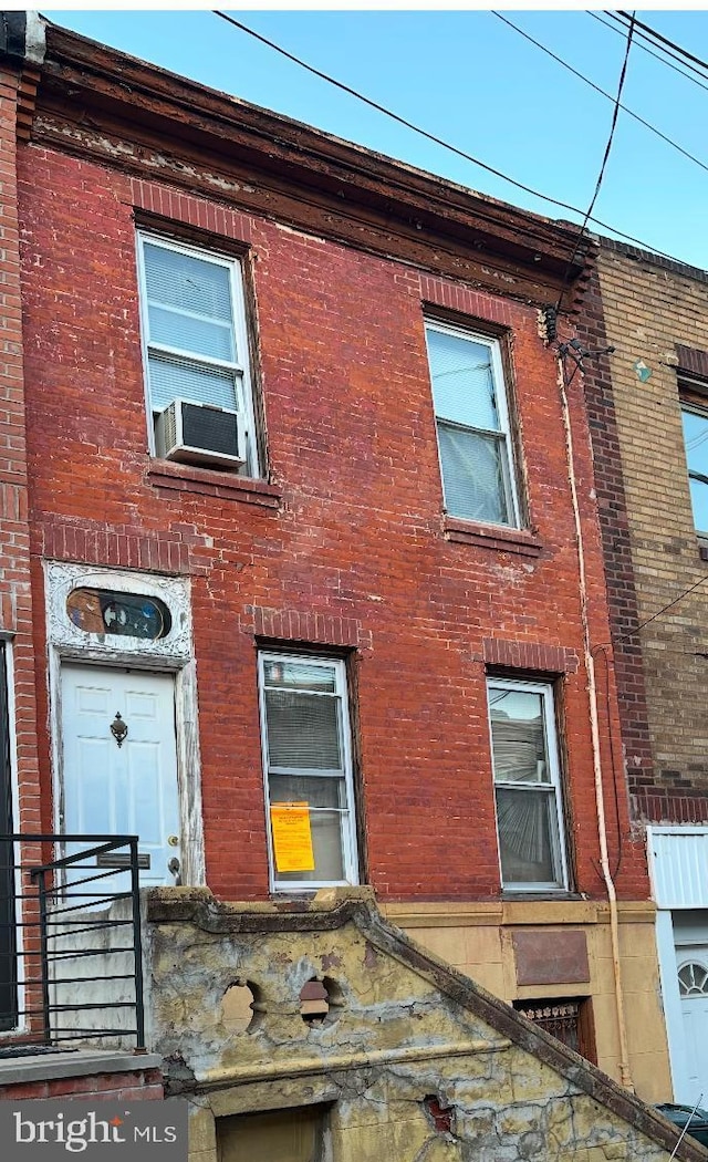 view of side of home with cooling unit