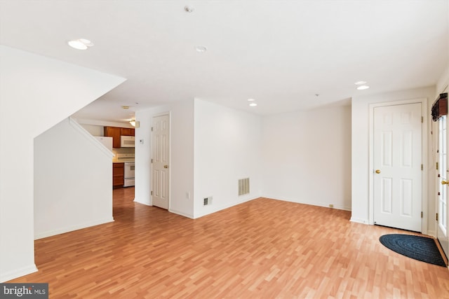 interior space with light hardwood / wood-style flooring