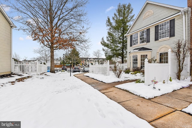 view of yard covered in snow