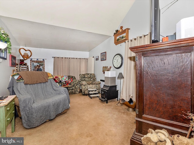 living area featuring lofted ceiling and carpet flooring