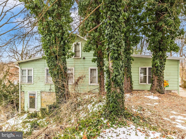 view of snow covered property