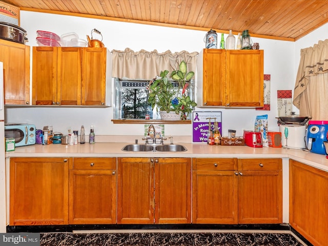 kitchen with sink and wood ceiling