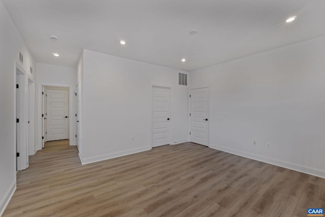 empty room with light wood-type flooring