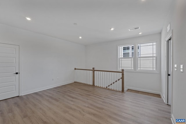 empty room featuring light hardwood / wood-style flooring