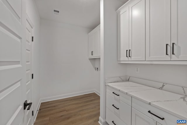 washroom featuring hardwood / wood-style flooring