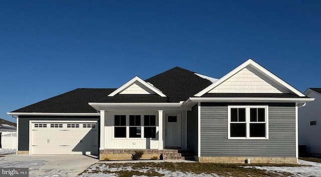 craftsman inspired home featuring a garage