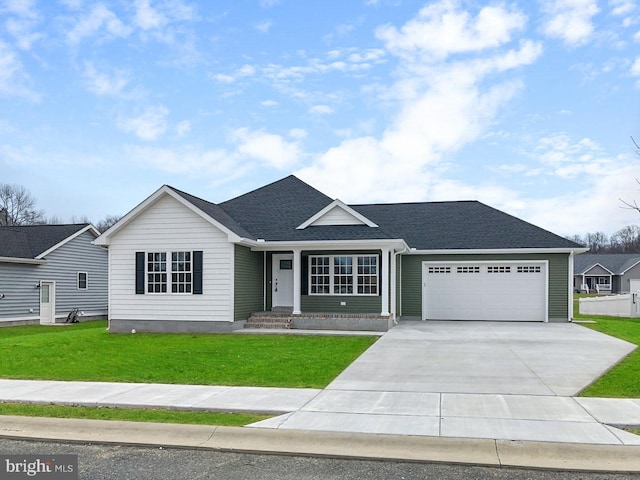 ranch-style house with a garage and a front lawn